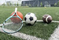 Assorted Sports Equipment Including a Basketball, Soccer Ball, Tennis ... Sports Equipment